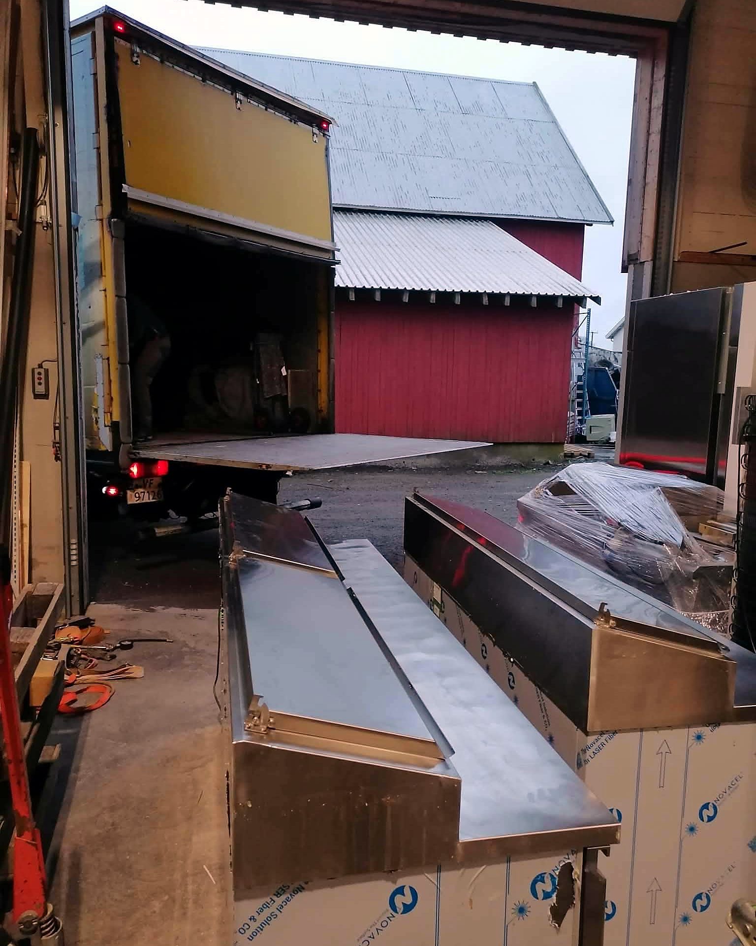 Commercial kitchen equipment ready for transport during a business move